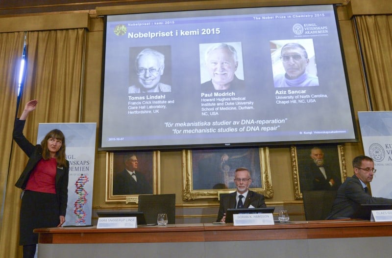 Professors sara snogerup linse, goran k. hansson and claes gustafsson, members of the nobel assembly, talk to the media at a news conference at the royal swedish academy in stockholm