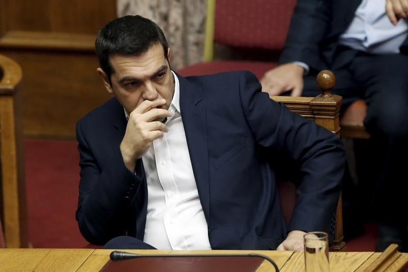 Feu vert du parlement grec aux reformes pour debloquer une aide
