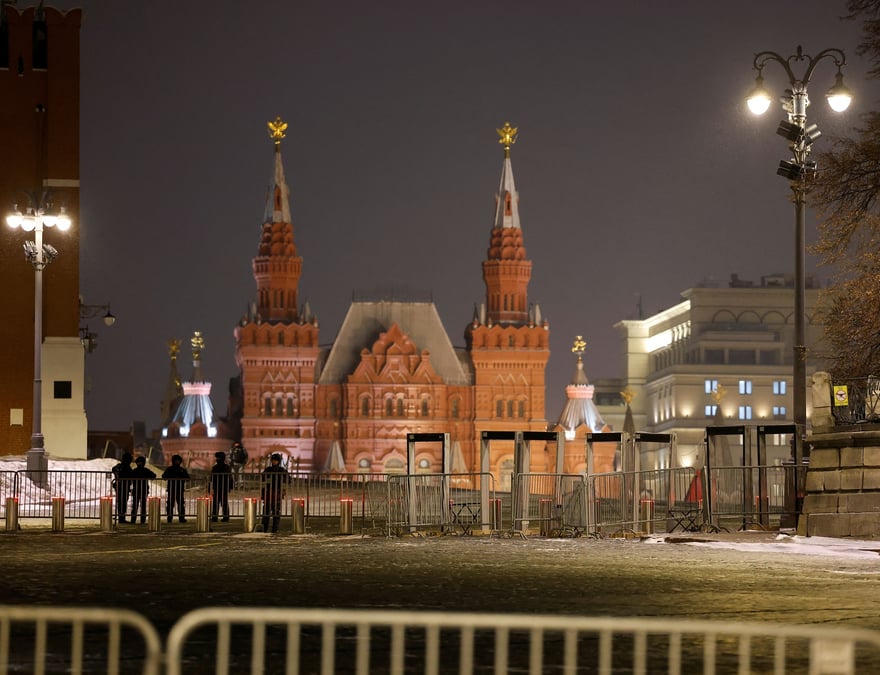 Law enforcement officers stand guard in red square during new year's eve celebrations in moscow