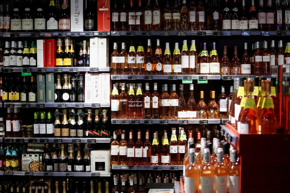 Des bouteilles de vin rose sont exposees a la vente dans un supermarche monoprix du groupe casino, a paris