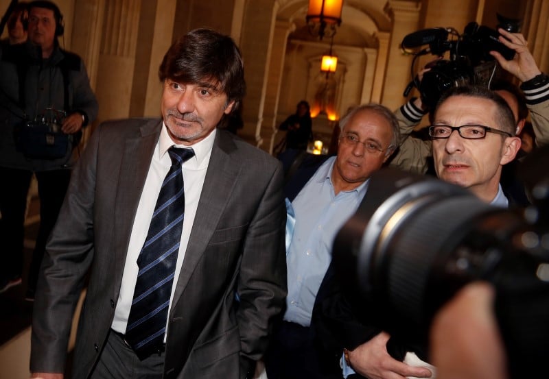 Michel neyret, french former deputy chief ot the judiciary police of lyon, arrives for the start of his trial at the courthouse in paris