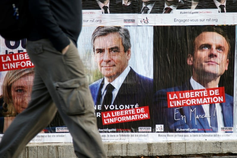 Le duel a distance entre fillon et macron tourne a l'aigre