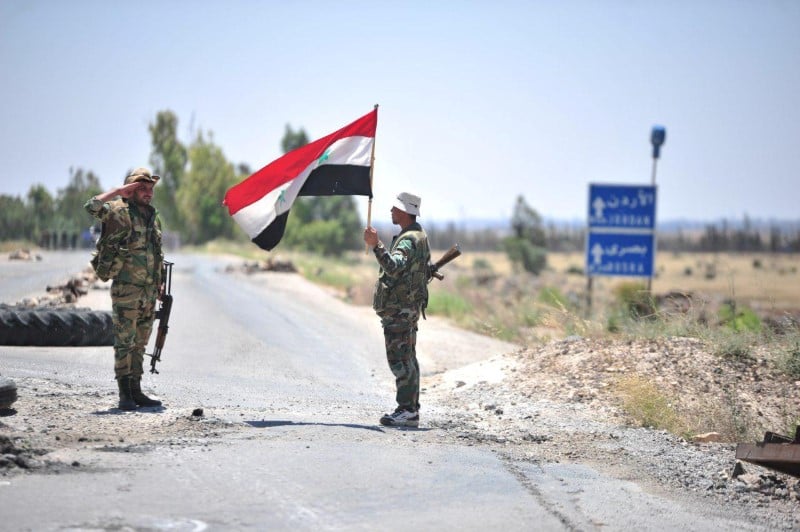 L'etat syrien s'apprete a hisser le drapeau sur la ville rebelle de deraa selon des temoins