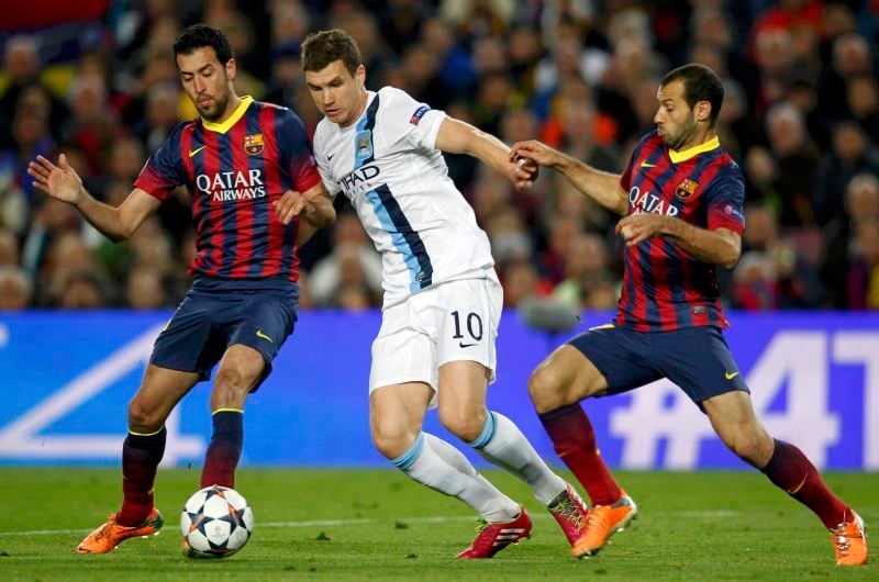 Ligue des champions: le PSG et le Barça accèdent aux quarts