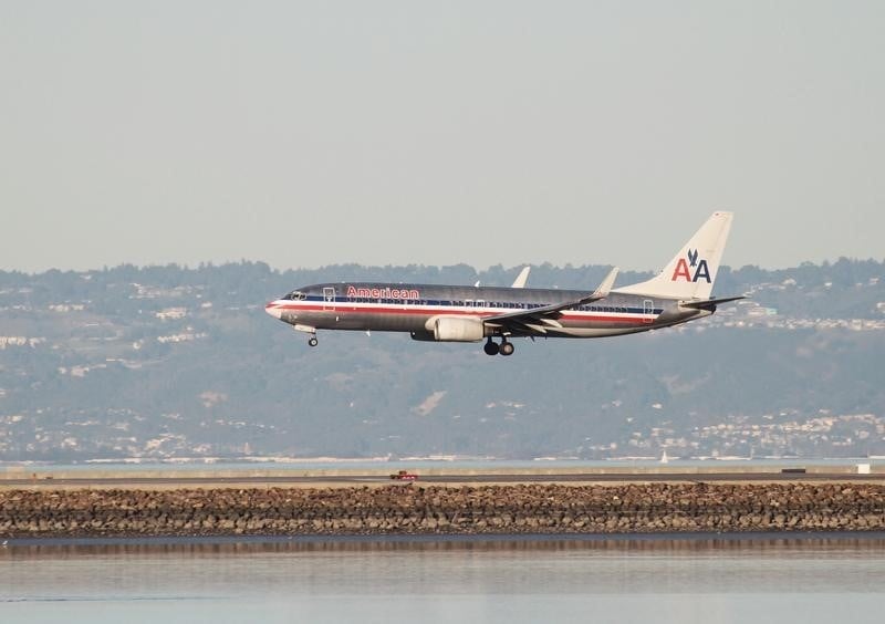 Us airways integre a american airlines
