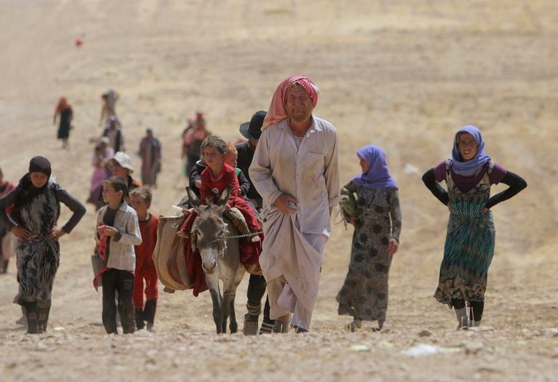 Des milliers de Yazidis d'Irak ont réussi à fuir le mont Sinjar