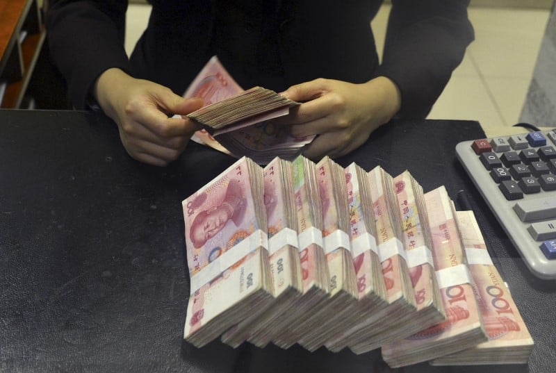 Le yuan chinois devalue de pres de 2% 