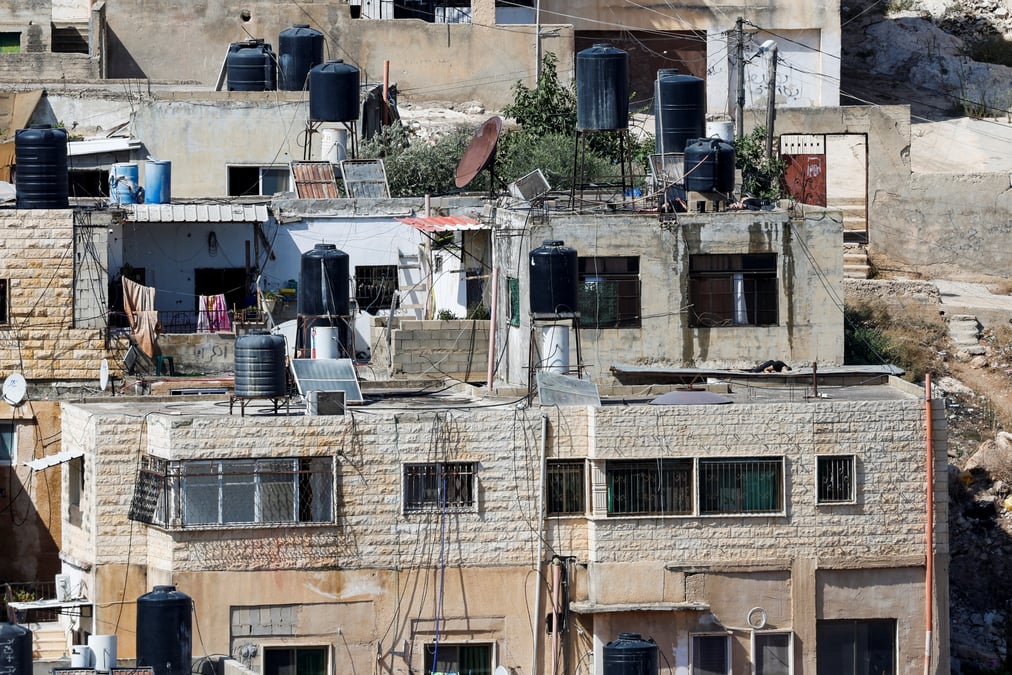 Les corps de trois palestiniens tues lors d'un raid aerien a qabatya