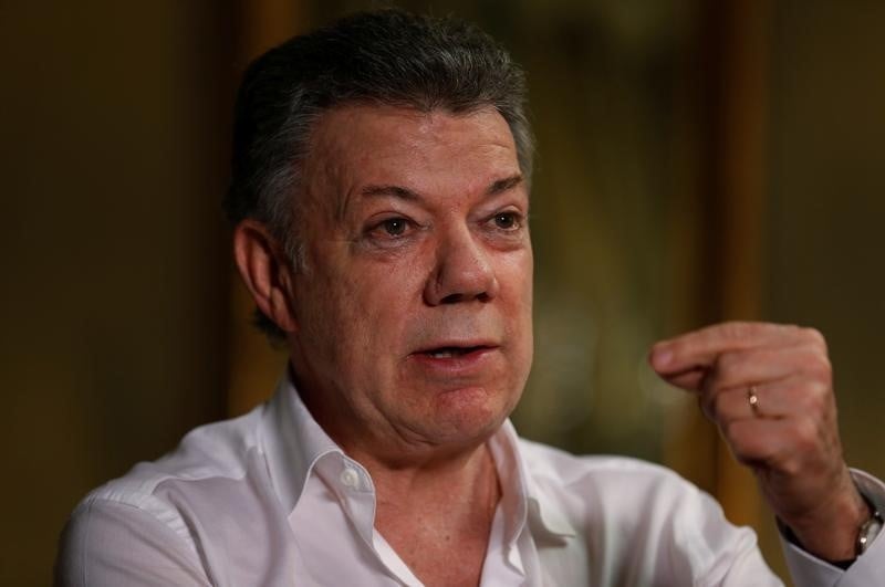 Santos reconnait la responsabilite de l'etat colombien dans des assassinats politiques