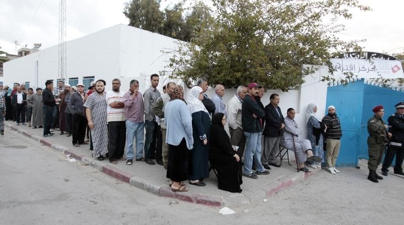 Les Tunisiens votent, à la recherche de la pleine démocratie