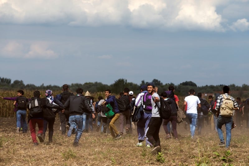 L'espagne promet de se conformer au quota de refugies etabli par l'ue