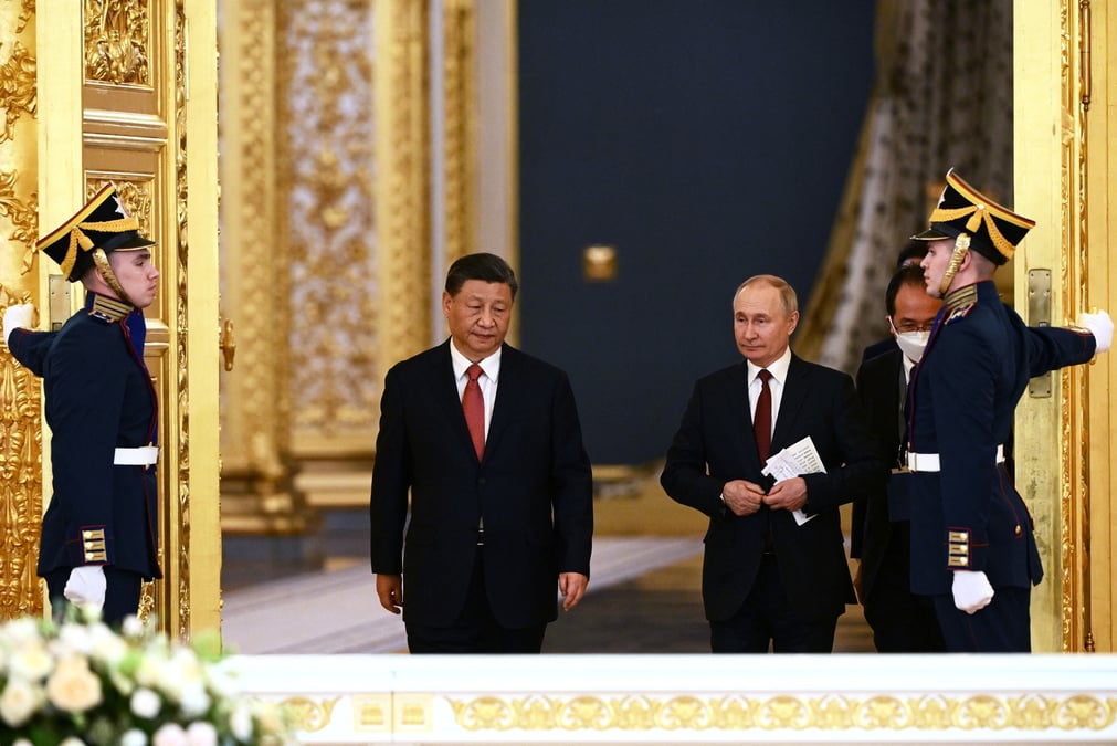 Le president russe poutine s'entretient avec le president chinois xi a moscou