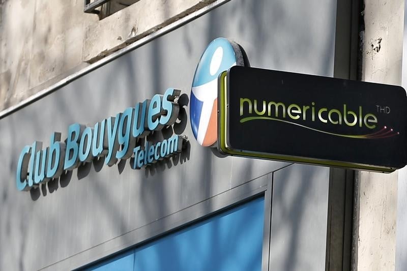 Numericable s'envole en Bourse, Bouygues chute