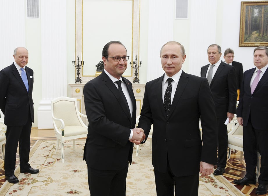 Francois hollande et vladimir poutine prets a cooperer contre l'ei en syrie