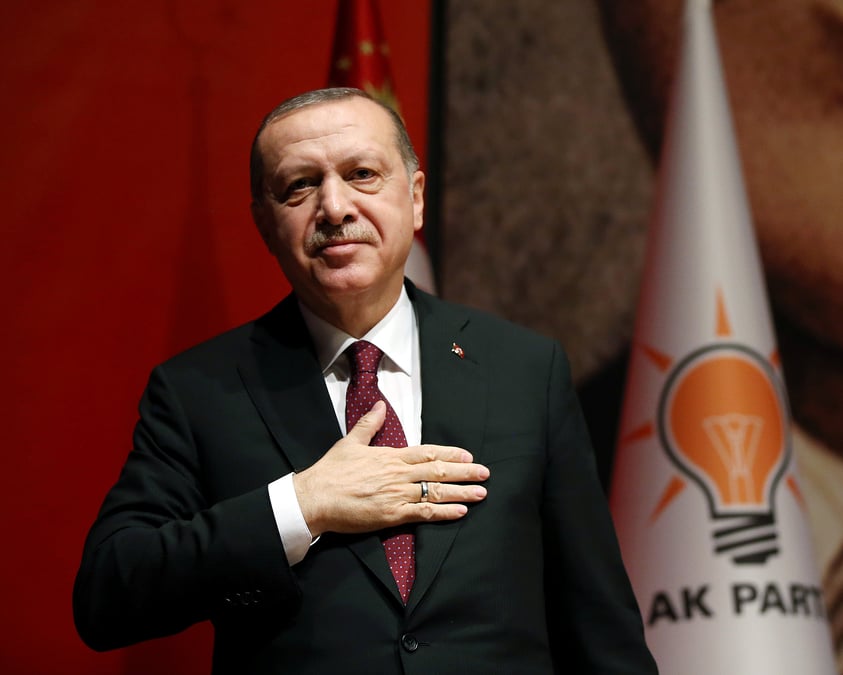 Erdogan menace d'etendre l'offensive turque jusqu'a la frontiere irakienne