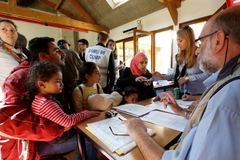Plus de 600 villes representees a paris pour planifier l'accueil des refugies