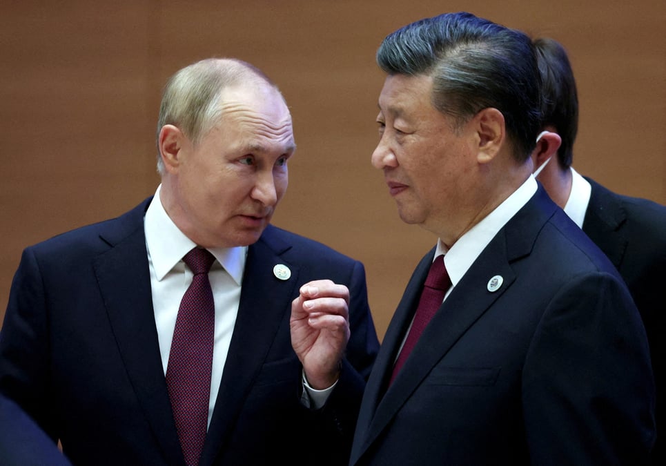 Photo d'archives du president russe vladimir poutine et du president chinois xi jinping avant une reunion lors du sommet de l'ocs a samarcande