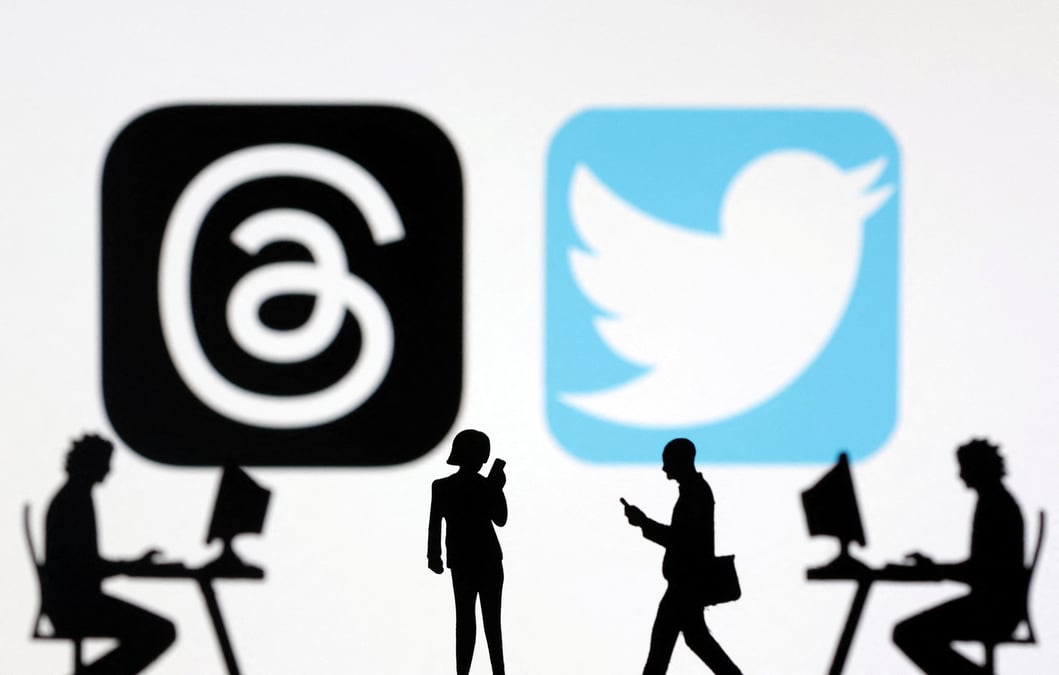 Illustration des logos de l'application meta threads et twitter