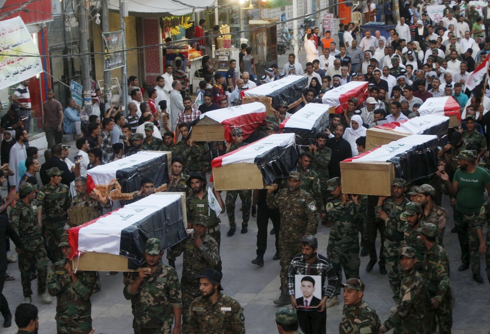 Vingt-quatre irakiens condamnes a mort pour le massacre de camp speicher