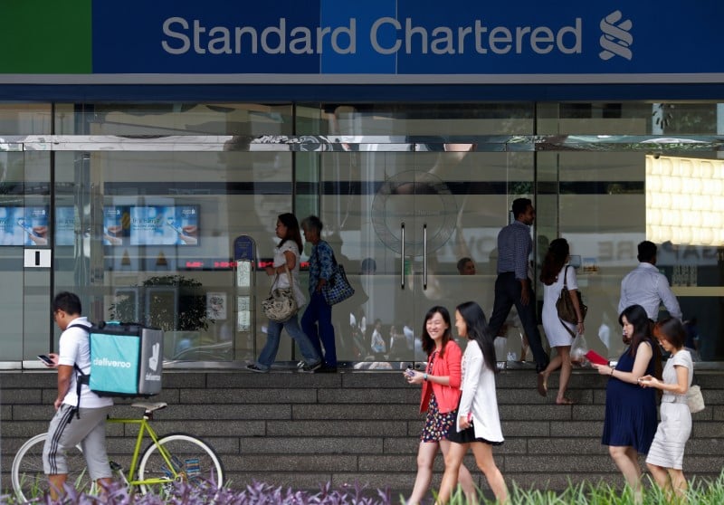 Stanchart reprend le dividende apres une envolee de son benefice