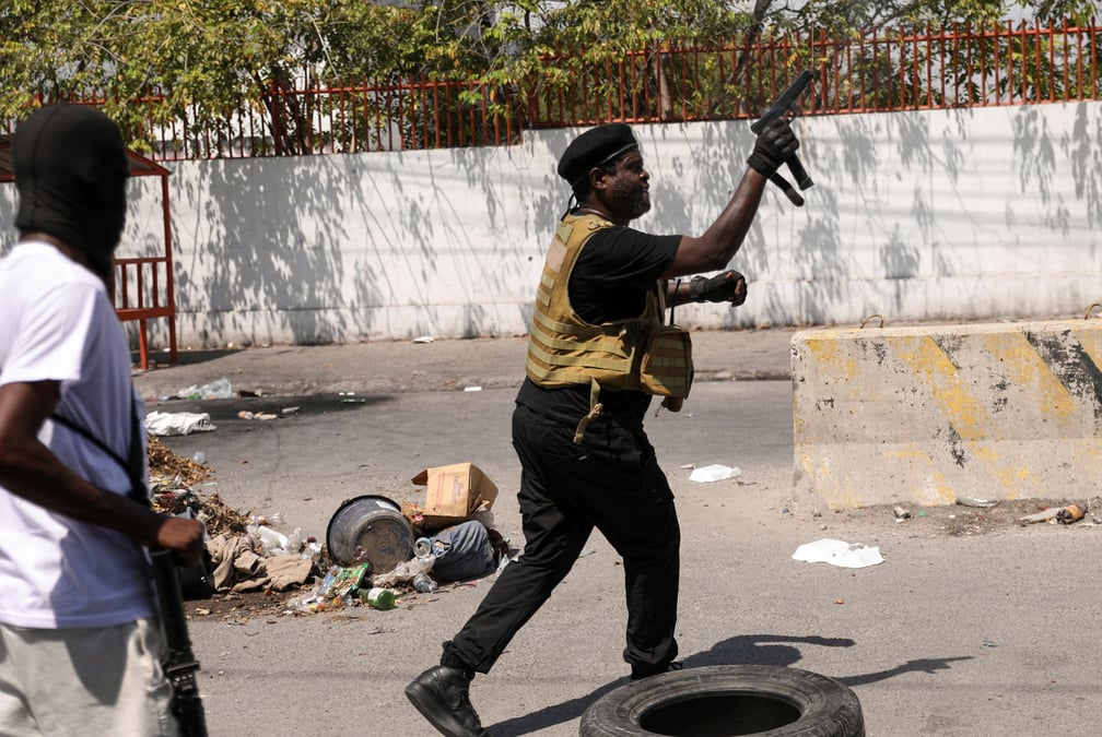 File photo: former police officer jimmy "barbecue" cherizier addresses the media, in port-au-prince