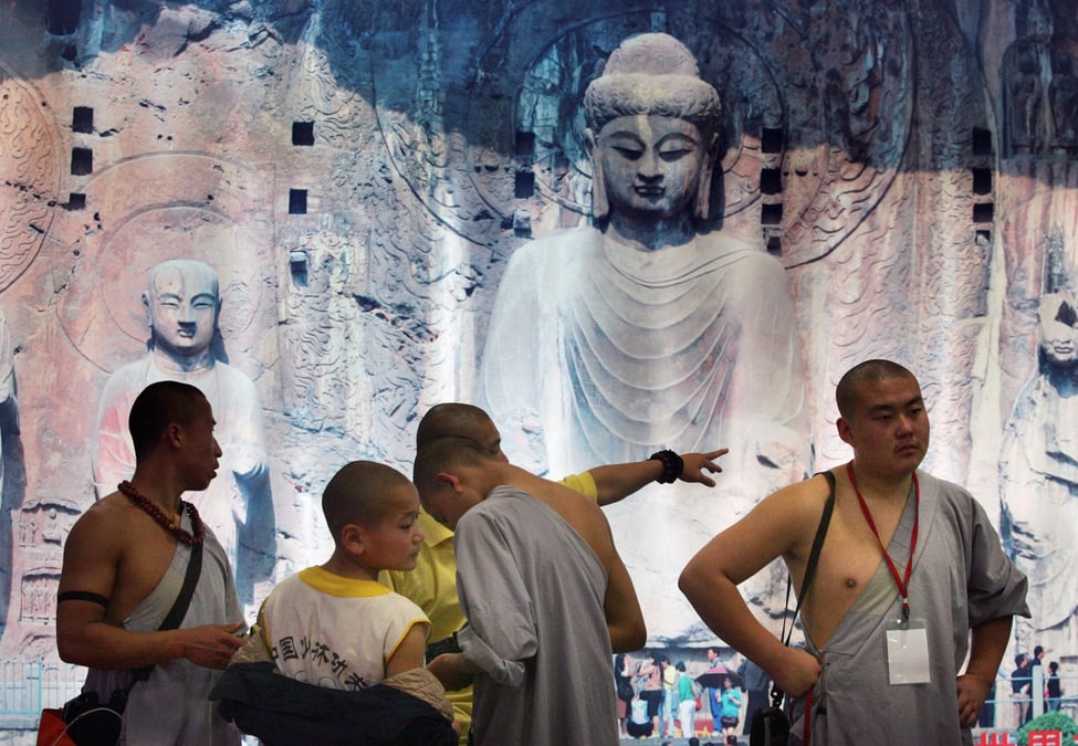 Photo d'archives des moines du temple shao lin en chine lors du salon international du voyage de taipei