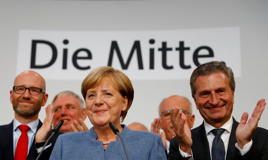 Victoire en demi-teinte pour merkel, contrainte a d'ardues negociations