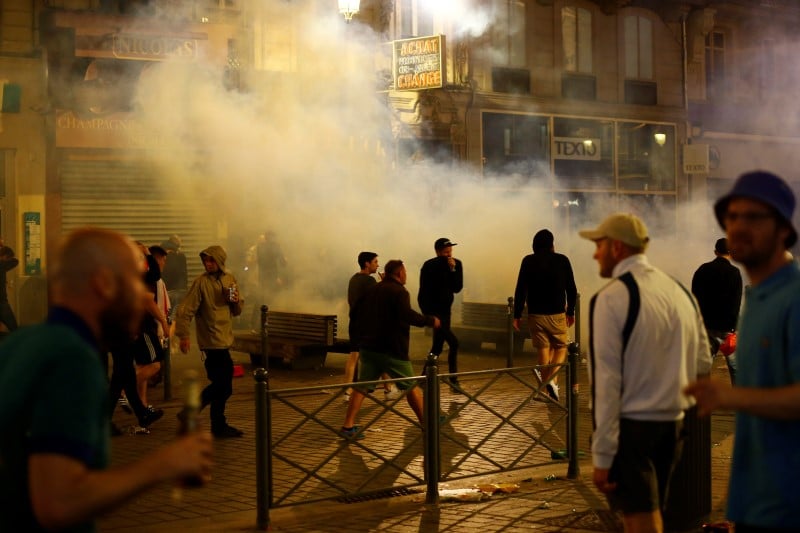 England fans run through tear gas in lille - euro 2016