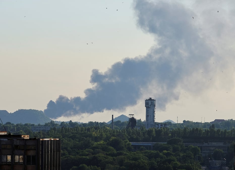 Smoke rises after shelling during ukraine-russia conflict in donetsk