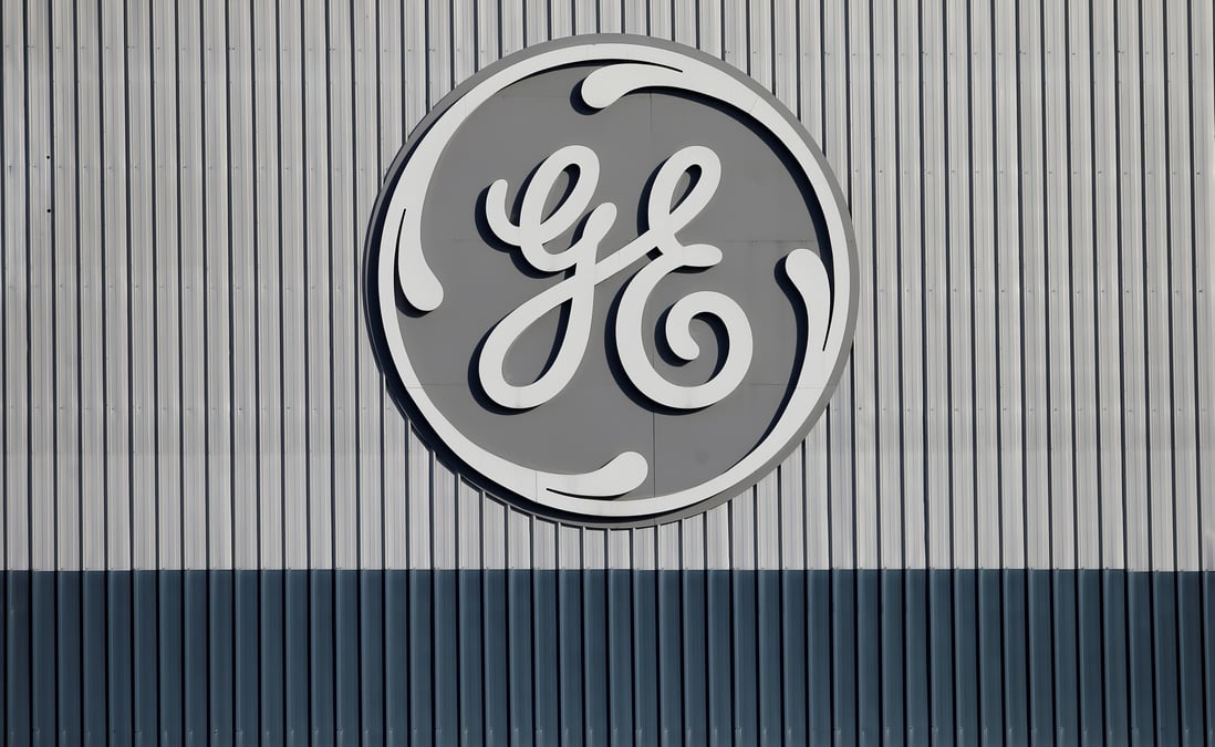 Ge triple son benefice et reduit ses sorties de capitaux