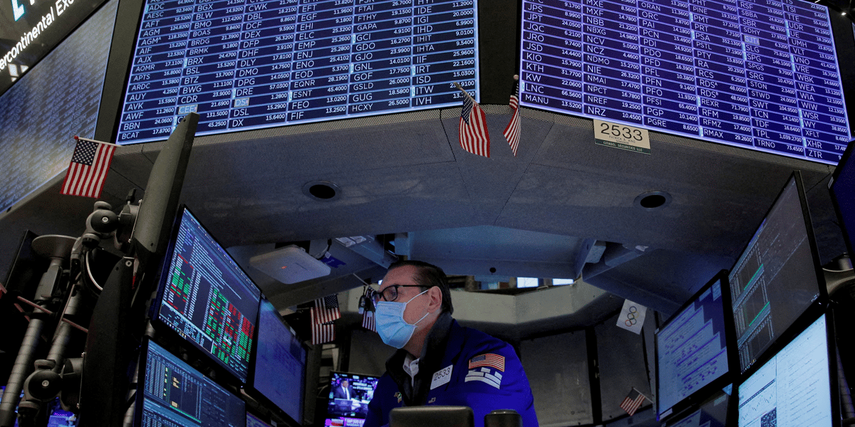 Traders work on the floor of the New York Stock Exchange (NYSE) New York