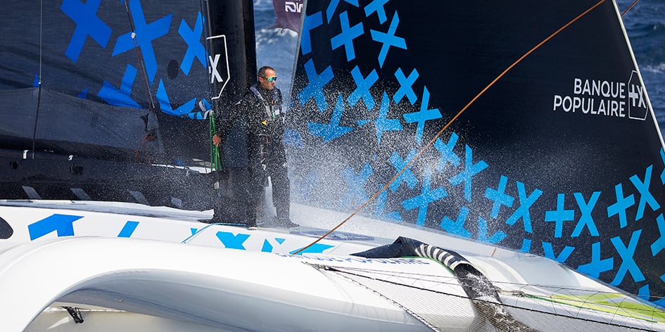 Armel Le Cleac’h à bord de « Maxi Banque populaire XI » au large de Lorient, à la fin du mois de juin.