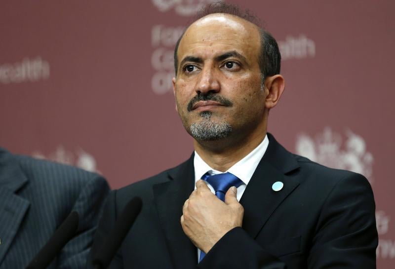 Le chef de l'opposition syrienne exige le départ d'Assad