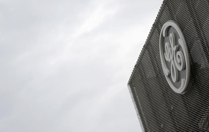 Ge serait pres de vendre tout ou partie de ses biens immobiliers