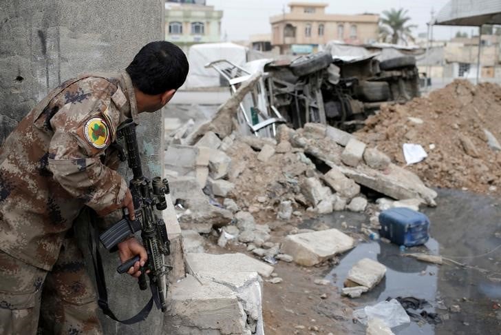 Les deux camps accuses d'exactions a mossoul