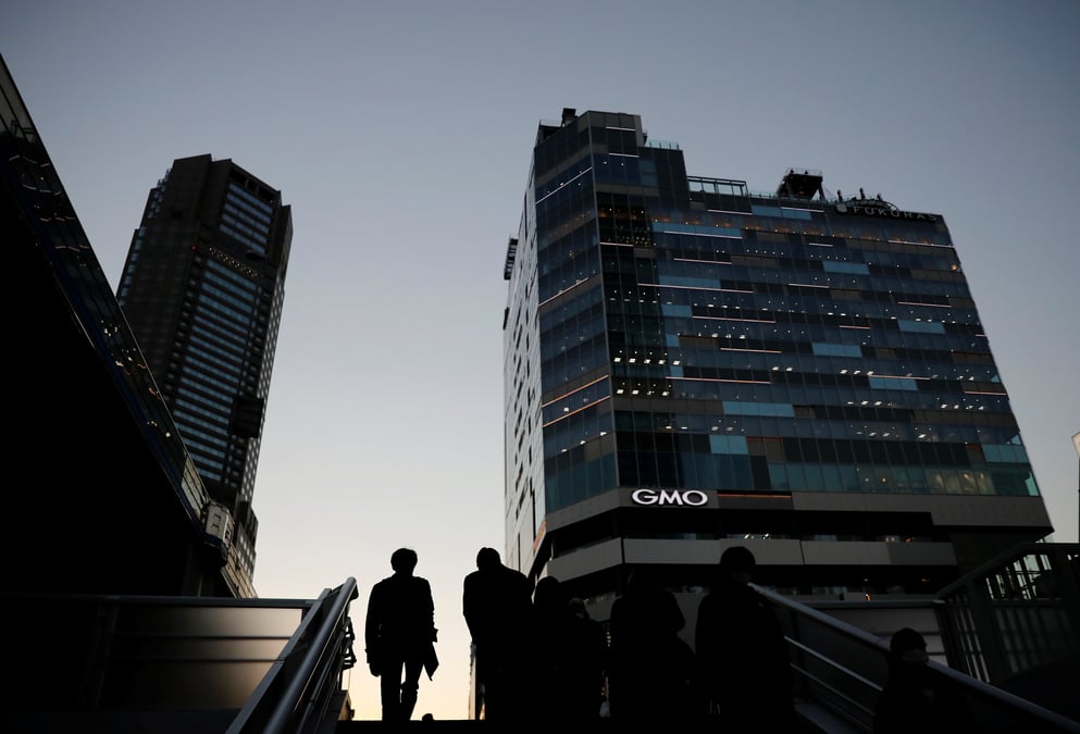 Japon: l'economie a progresse plus qu'attendu au quatrieme trimestre, portee par le commerce