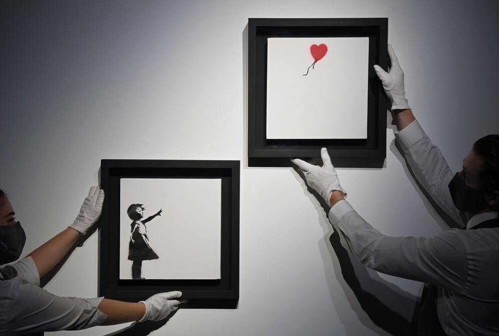 Une oeuvre a moitie detruite de banksy vendue aux encheres a 25,4 millions de dollars