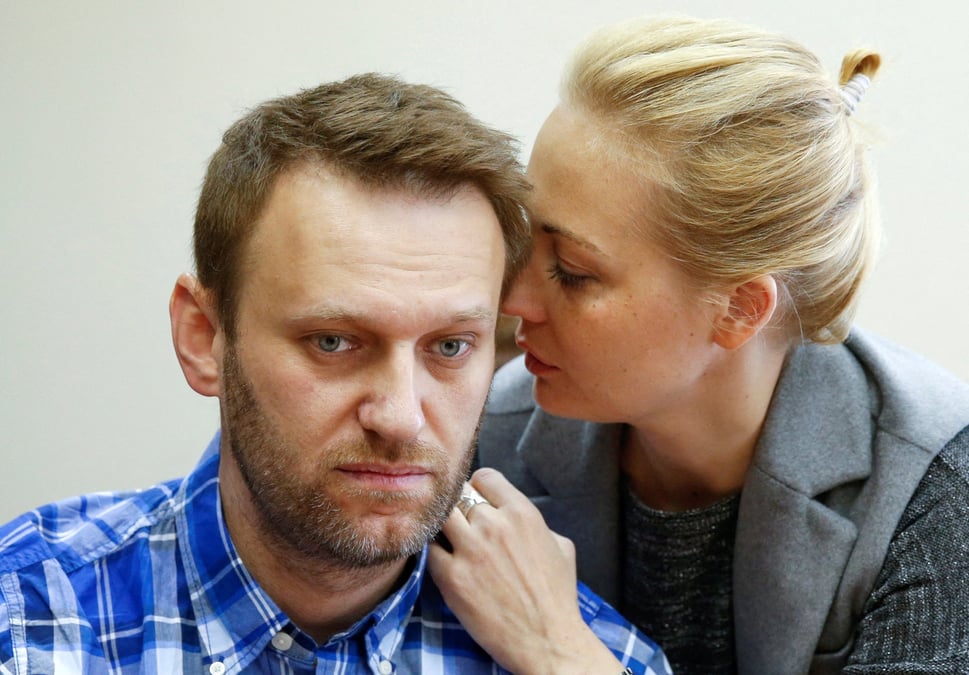 Photo d'archives: le leader de l'opposition russe alexei navalny et sa femme yulia assistent a une audience au tribunal du district de lublinsky a moscou