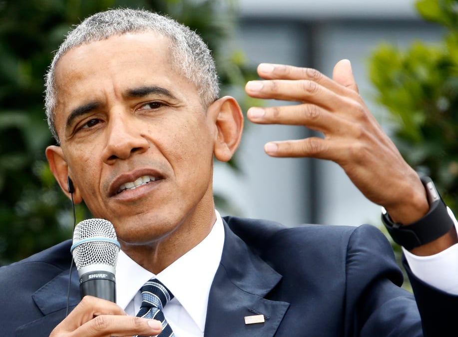 Obama denonce ceux qui se cachent "derriere des murs"