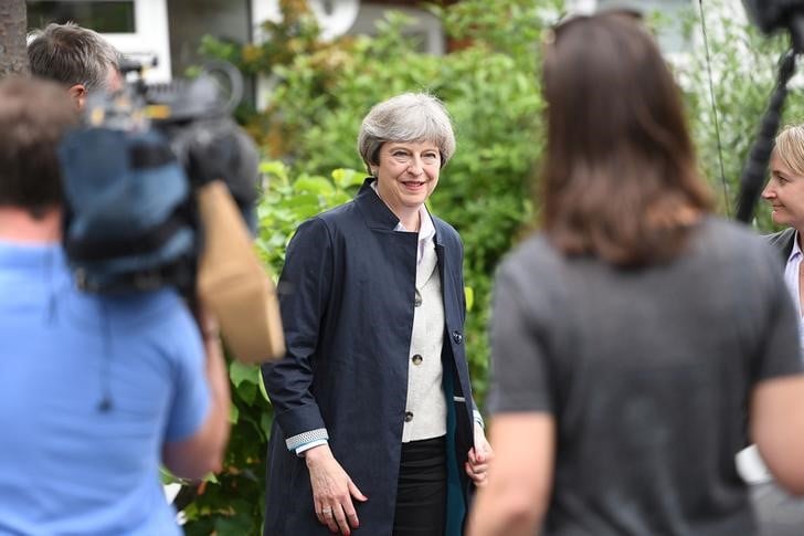 May: les negociations sur le brexit debuteront le 19/06