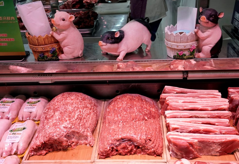 Pekin exempte le porc et le soja de ses represailles douanieres