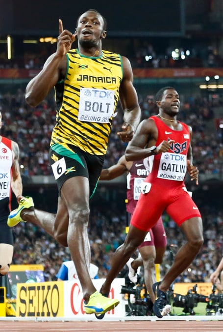 Usain bolt realise le double 100-200m a pekin