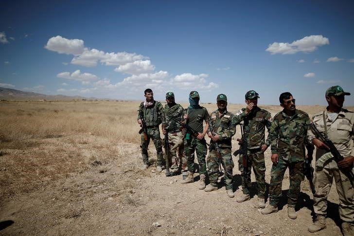 En irak, baaj, ville a la frontiere syrienne, reprise a l'ei