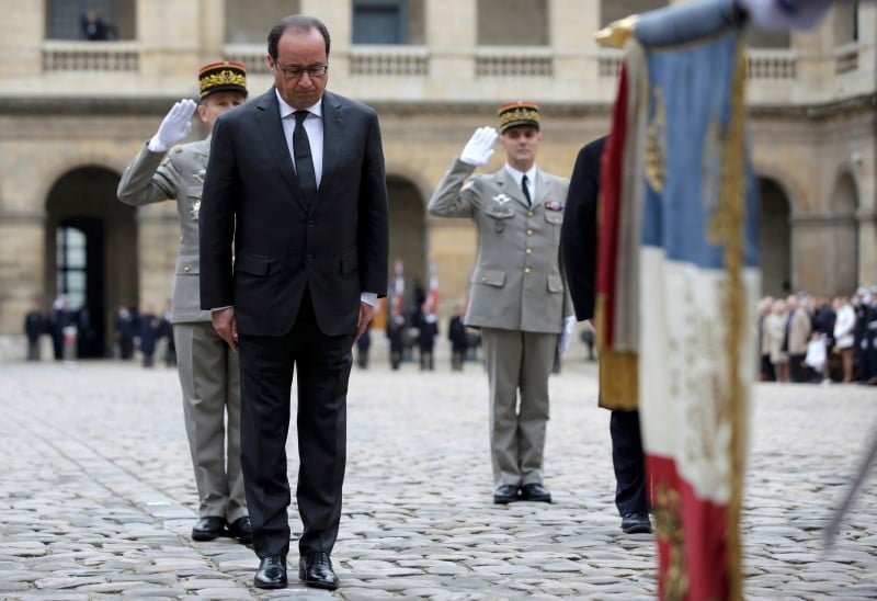 Alain juppe defend devant hollande l'unite apres les attentats