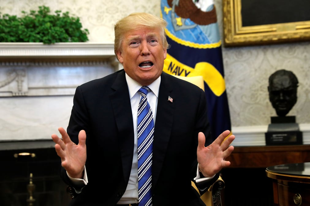 Trump dit garder son projet sur les tarifs douaniers malgre la pression