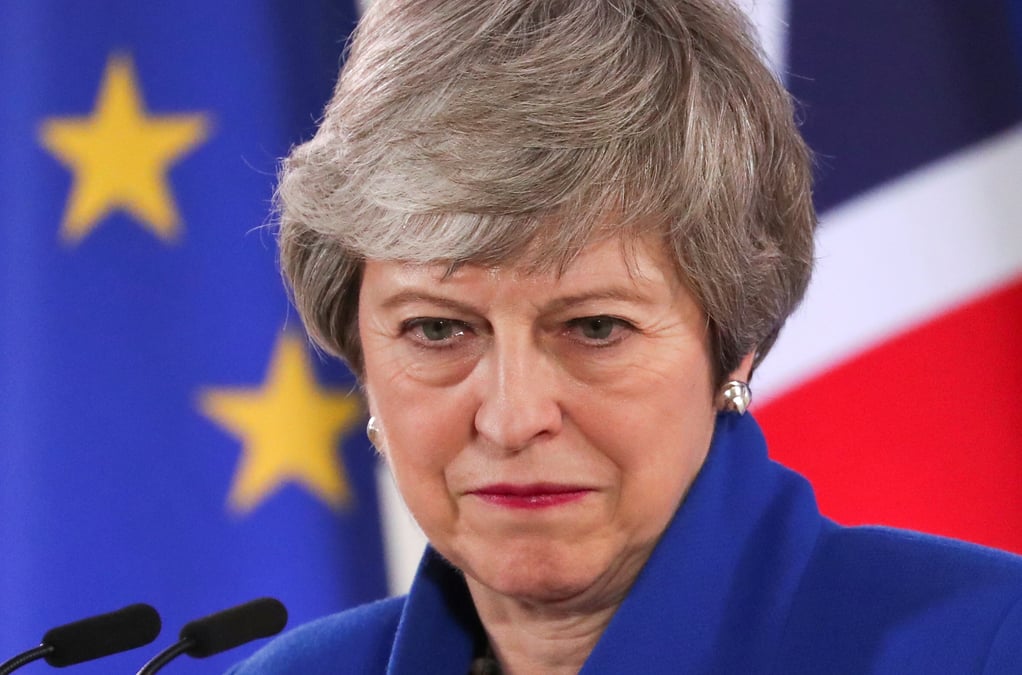 Theresa may s'explique aux communes apres le report du brexit