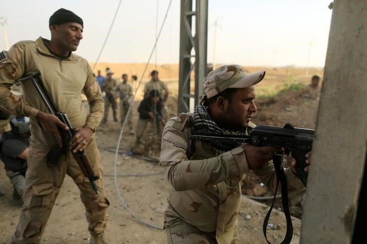 Les forces irakiennes dans la derniere ville au sud de mossoul