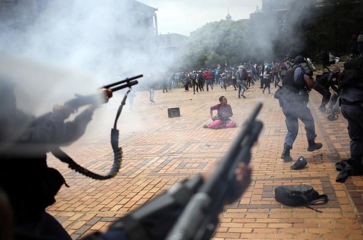 A student is seen during clashes with south african police at johannesburg's university of the witwatersrand, south africa