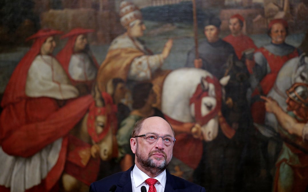 Schulz critique la position de merkel sur l'automobile