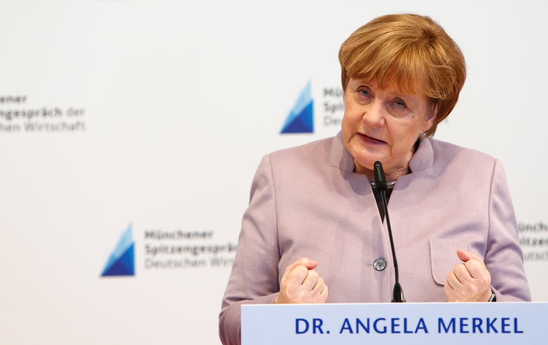 Merkel defend le libre-echange avant son entretien avec trump